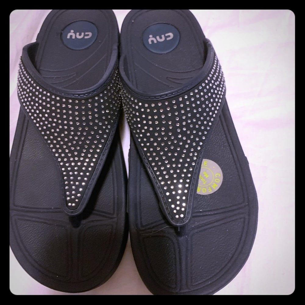 CNY navy and rhinestone flip flops.